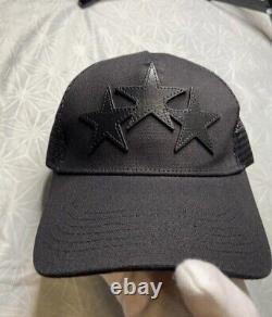 Amiri Black 3 Star Trucker Hat retail price is $320